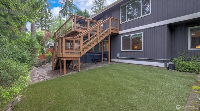 4017 239th Pl SE, Sammamish, WA 98029 - back of property with a lawn, a wooden deck, stairs, and a hot tub