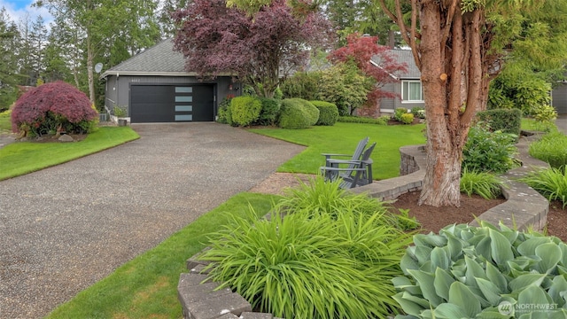 4017 239th Pl SE, Sammamish, WA 98029 - obstructed view of property featuring driveway, an attached garage, a front yard, and roof with shingles