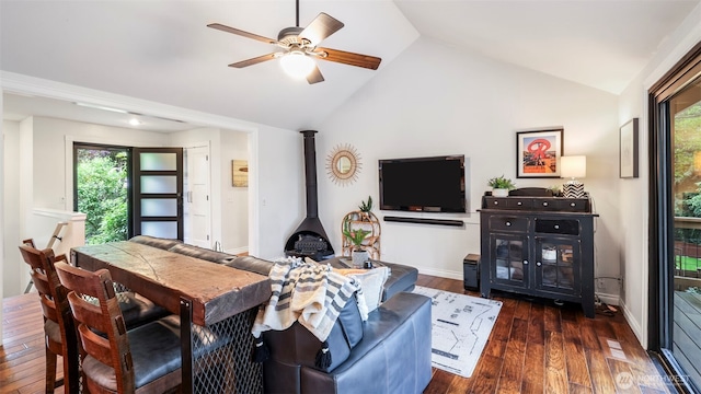 4017 239th Pl SE, Sammamish, WA 98029 - living room with a wood stove, vaulted ceiling, a ceiling fan, dark wood finished floors, and baseboards