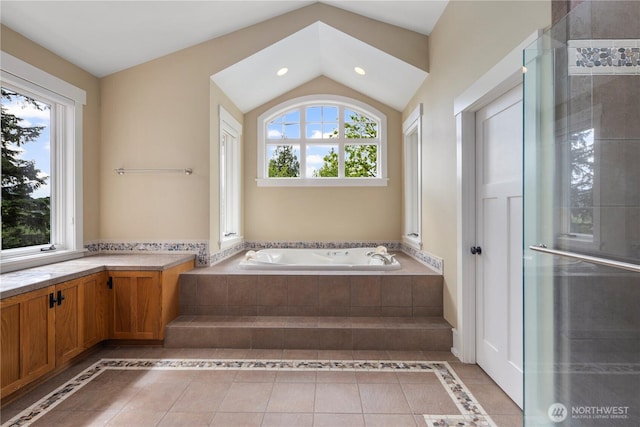 4155 212th Way SE, Sammamish, WA 98075 - full bath featuring a garden tub, a shower with door, vaulted ceiling, recessed lighting, and tile patterned flooring