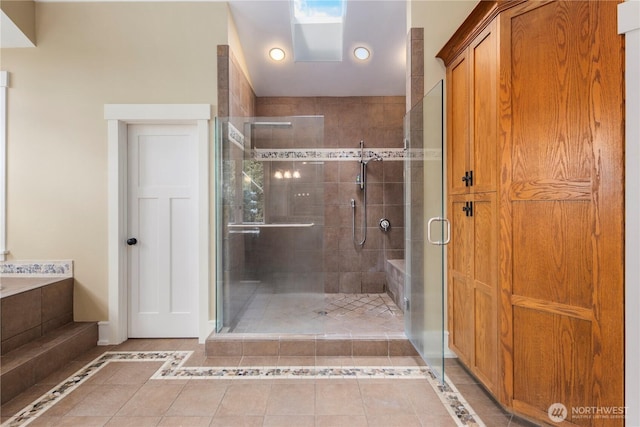 4155 212th Way SE, Sammamish, WA 98075 - bathroom with a stall shower, tile patterned flooring, recessed lighting, and inlaid floor details