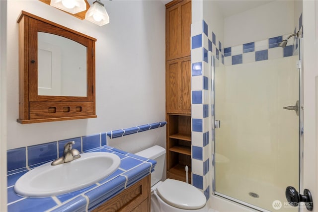 4155 212th Way SE, Sammamish, WA 98075 - bathroom featuring a shower stall, toilet, vanity, and tile walls