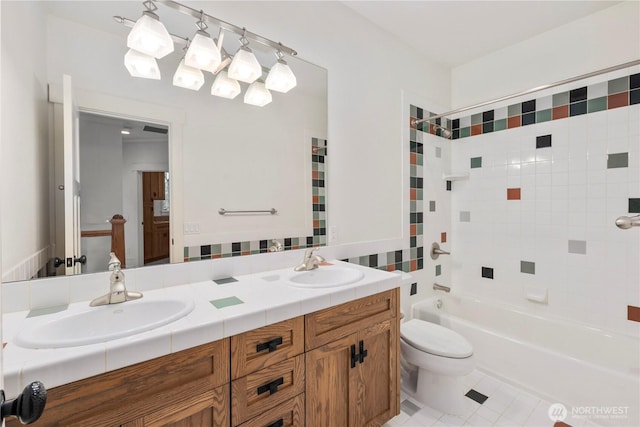 4155 212th Way SE, Sammamish, WA 98075 - full bathroom with toilet, double vanity, tile patterned flooring, tub / shower combination, and tasteful backsplash