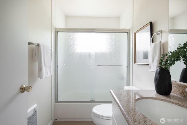 11519 SE 169th St, Renton, WA 98055 - full bathroom featuring vanity, healthy amount of natural light, and enclosed tub / shower combo
