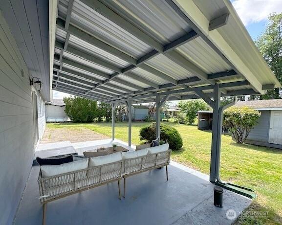 11519 SE 169th St, Renton, WA 98055 - view of patio featuring an outdoor hangout area and an outdoor structure
