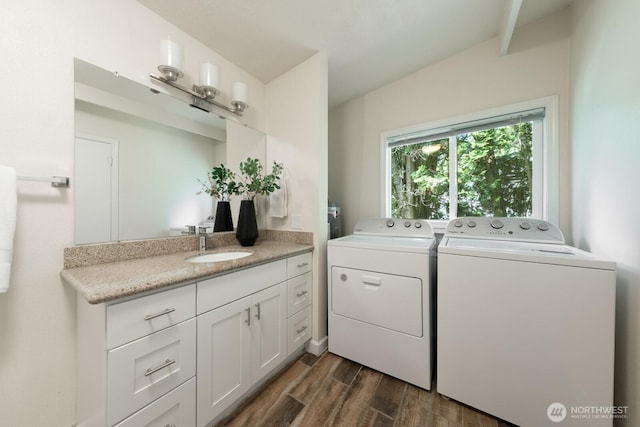 11519 SE 169th St, Renton, WA 98055 - laundry room featuring washer and clothes dryer and dark wood-style floors