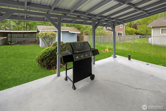 11519 SE 169th St, Renton, WA 98055 - fenced backyard with a patio, a grill, and an outdoor fire pit