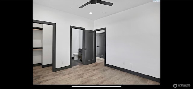 3312 Bing St, West Richland, WA 99353 - unfurnished bedroom featuring light wood finished floors, baseboards, ensuite bathroom, and ceiling fan