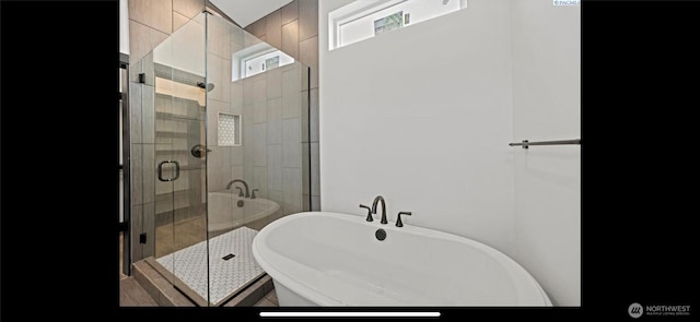3312 Bing St, West Richland, WA 99353 - bathroom featuring a stall shower and a soaking tub