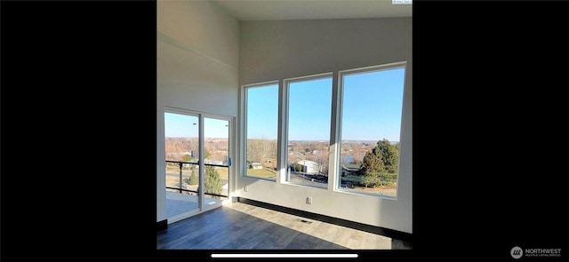 3312 Bing St, West Richland, WA 99353 - empty room with wood finished floors and baseboards