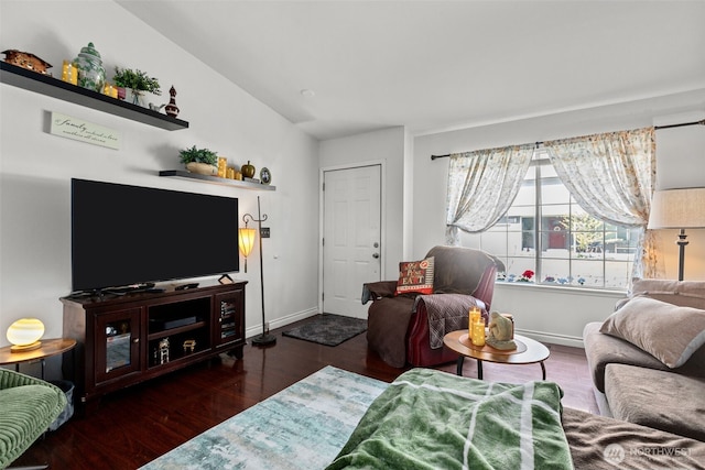living room featuring wood finished floors and baseboards