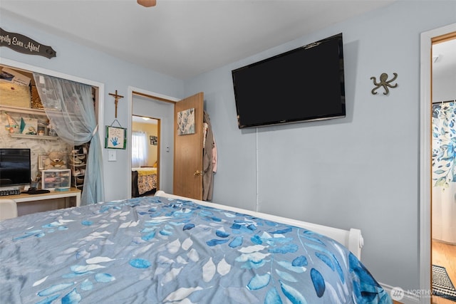 bedroom featuring ceiling fan