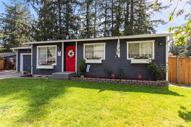 view of front of property with driveway and a garage