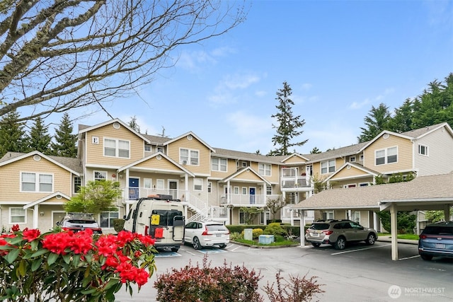 5400 Harbour Pointe Blvd Unit E102, Mukilteo, WA 98275 - view of front of house featuring a residential view and covered parking