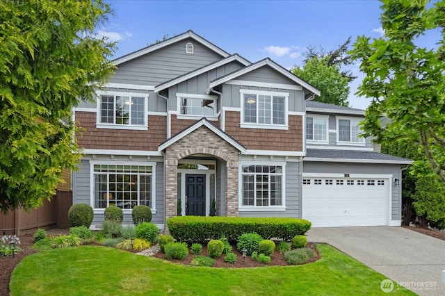 view of front of house with driveway, a garage, and board and batten siding