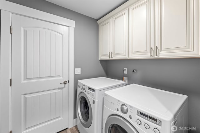 626 Duck Lake Dr SE, Ocean Shores, WA 98569 - washroom with cabinet space and independent washer and dryer