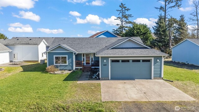 626 Duck Lake Dr SE, Ocean Shores, WA 98569 - ranch-style home featuring driveway, a front lawn, an attached garage, and a shingled roof