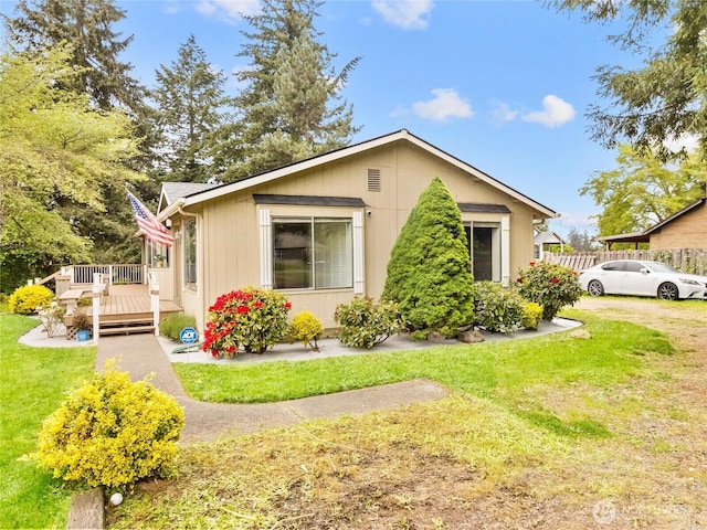 12120 A St S, Tacoma, WA 98444 - view of front of home featuring a deck and a front yard