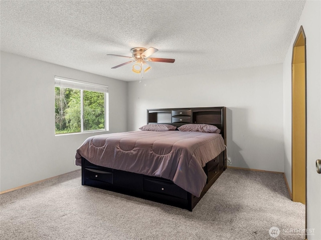 12120 A St S, Tacoma, WA 98444 - carpeted bedroom featuring a ceiling fan, a textured ceiling, and baseboards