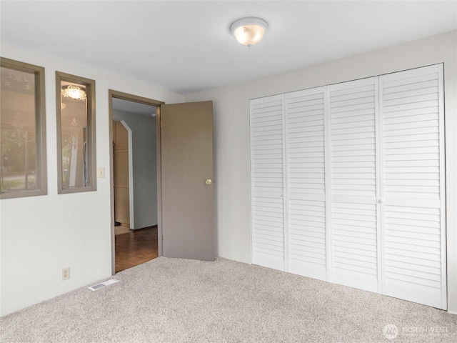 12120 A St S, Tacoma, WA 98444 - unfurnished bedroom with a closet and carpet floors