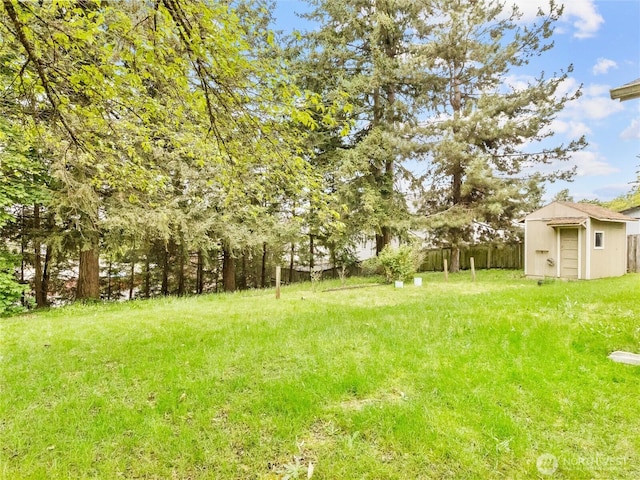 12120 A St S, Tacoma, WA 98444 - view of yard with a shed, an outbuilding, and fence