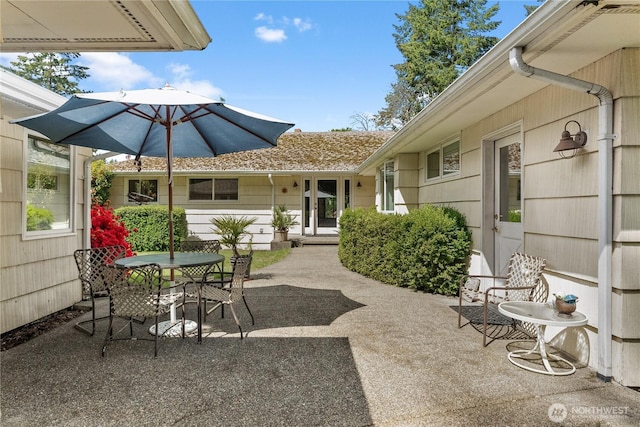 16 Loch Ln SW, Lakewood, WA 98499 - view of patio / terrace with outdoor dining area