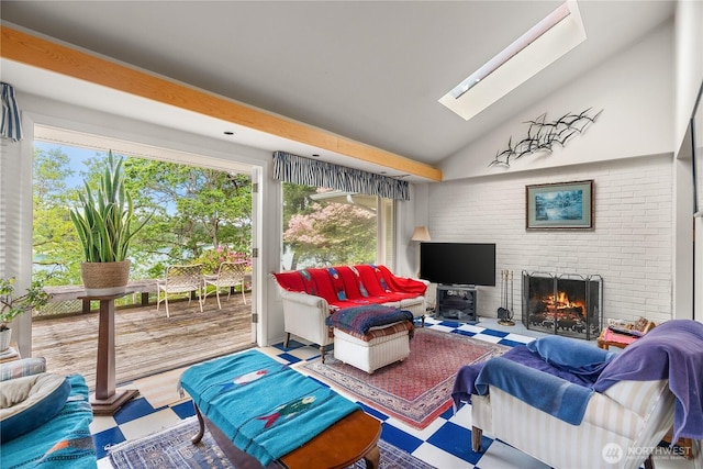 16 Loch Ln SW, Lakewood, WA 98499 - living room with tile patterned floors, a skylight, a fireplace, and lofted ceiling