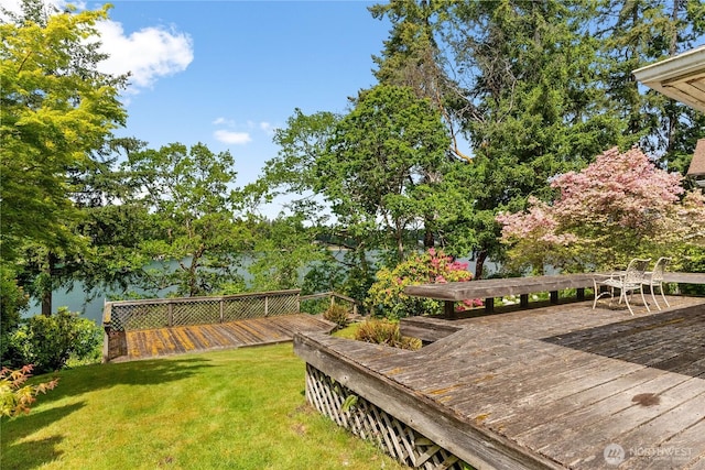 16 Loch Ln SW, Lakewood, WA 98499 - wooden deck with a lawn