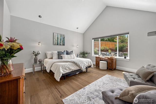 9402 72nd Ave E, Puyallup, WA 98371 - bedroom with high vaulted ceiling, wood finished floors, and baseboards