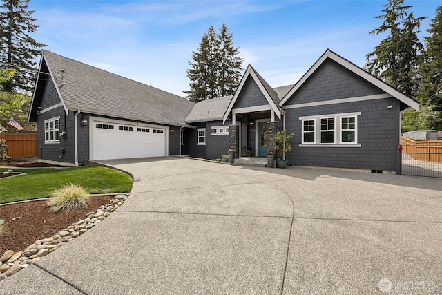 9402 72nd Ave E, Puyallup, WA 98371 - view of front facade featuring fence, concrete driveway, a shingled roof, and a garage