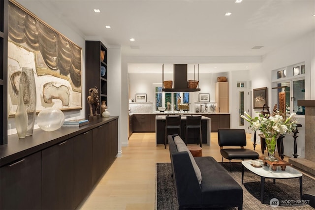 10208 47th Ave SW, Seattle, WA 98146 - living room featuring light wood-style floors and recessed lighting