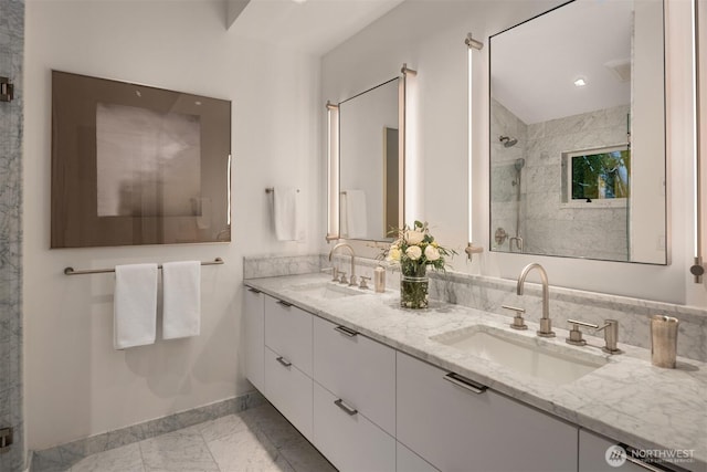 10208 47th Ave SW, Seattle, WA 98146 - full bathroom featuring marble finish flooring, a shower stall, baseboards, and double vanity