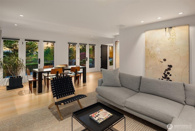 10208 47th Ave SW, Seattle, WA 98146 - living area with french doors, light wood-style flooring, and recessed lighting