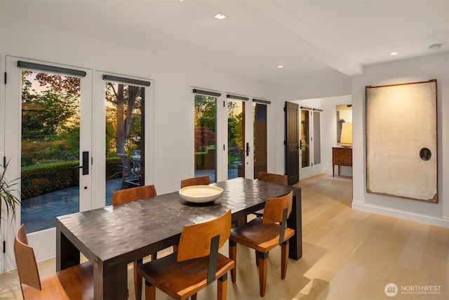10208 47th Ave SW, Seattle, WA 98146 - dining space featuring french doors, light wood-style flooring, recessed lighting, and baseboards