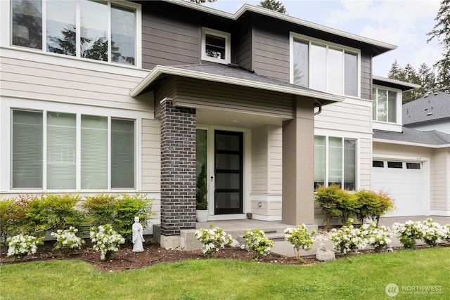 12421 Harwood Cove Ln SW, Lakewood, WA 98498 - view of front of property with a front lawn and a garage