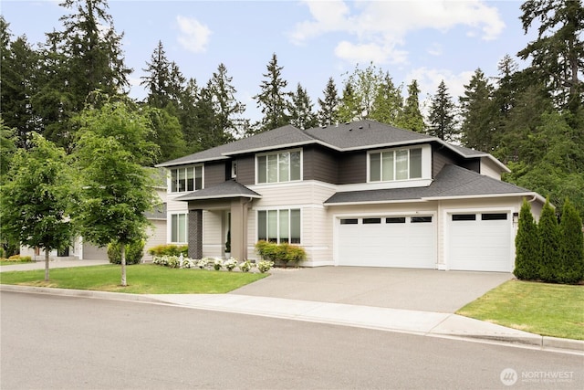 12421 Harwood Cove Ln SW, Lakewood, WA 98498 - view of front of property featuring driveway, a front lawn, a shingled roof, and an attached garage