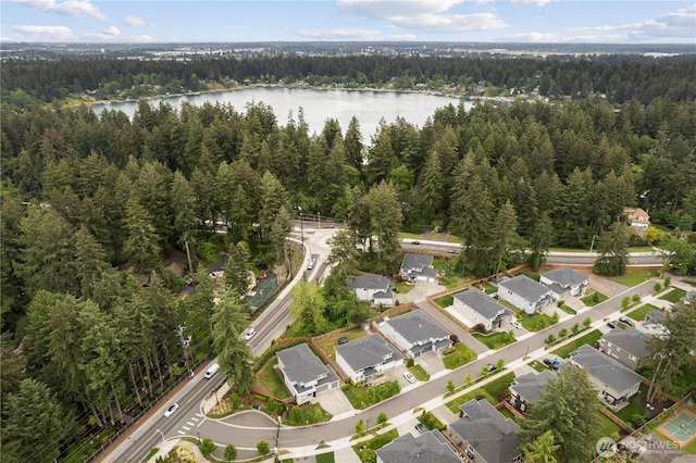 12421 Harwood Cove Ln SW, Lakewood, WA 98498 - aerial overview of property's location featuring a heavily wooded area, a large body of water, and nearby suburban area