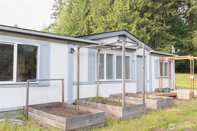 21833 127th Ave SE, Snohomish, WA 98296 - view of home's exterior with a garden