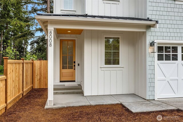 8008 222nd St SW, Edmonds, WA 98026 - doorway to property with fence, a standing seam roof, and metal roof