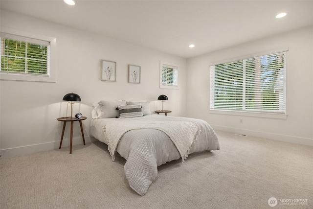 8008 222nd St SW, Edmonds, WA 98026 - carpeted bedroom with baseboards, multiple windows, and recessed lighting