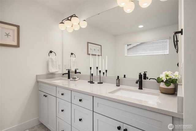 8008 222nd St SW, Edmonds, WA 98026 - bathroom featuring double vanity, baseboards, and recessed lighting