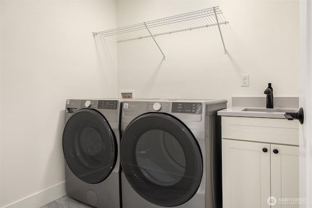 8008 222nd St SW, Edmonds, WA 98026 - clothes washing area featuring independent washer and dryer, cabinet space, and baseboards