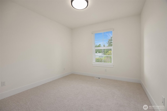 8008 222nd St SW, Edmonds, WA 98026 - unfurnished room with baseboards and light carpet
