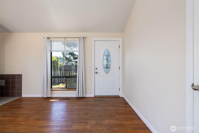 87 Swinomish Dr, La Conner, WA 98257 - foyer entrance featuring wood finished floors, baseboards, and vaulted ceiling
