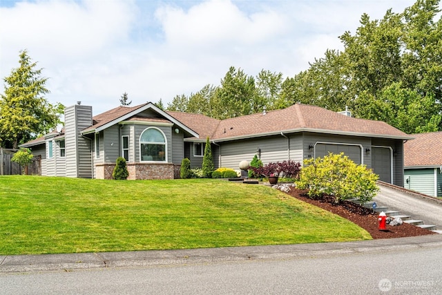 805 E Pacificview Dr, Bellingham, WA 98229 - single story home with a garage, a front yard, asphalt driveway, and brick siding