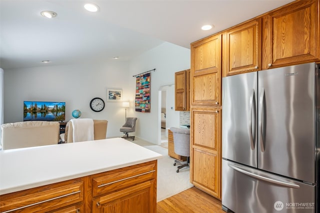 805 E Pacificview Dr, Bellingham, WA 98229 - kitchen with freestanding refrigerator, an office area, recessed lighting, light wood-type flooring, and light countertops