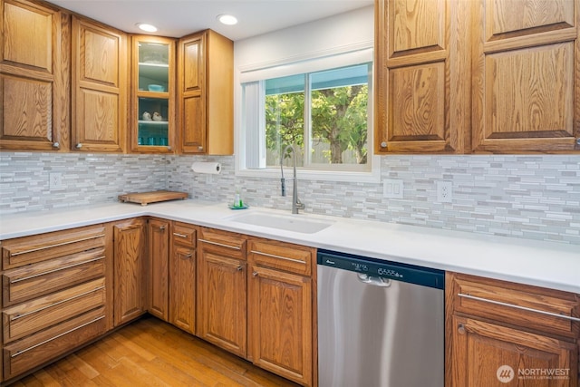 805 E Pacificview Dr, Bellingham, WA 98229 - kitchen with dishwasher, a sink, light wood-type flooring, decorative backsplash, and recessed lighting