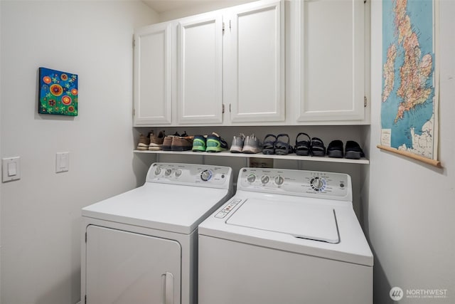 805 E Pacificview Dr, Bellingham, WA 98229 - laundry room featuring washer and clothes dryer and cabinet space