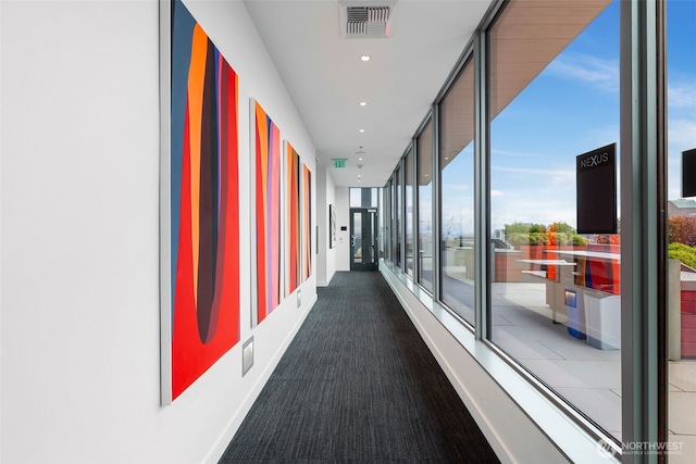 1808 Minor Ave Unit 301, Seattle, WA 98101 - corridor featuring floor to ceiling windows, carpet floors, and recessed lighting
