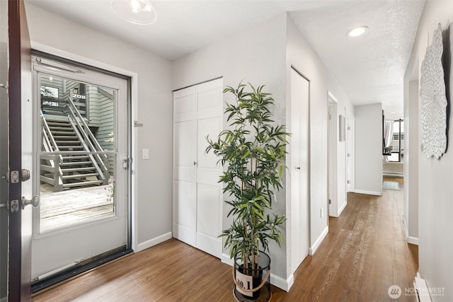7 Lake Bellevue Dr Unit 109, Bellevue, WA 98005 - entrance foyer with wood finished floors, baseboards, and recessed lighting